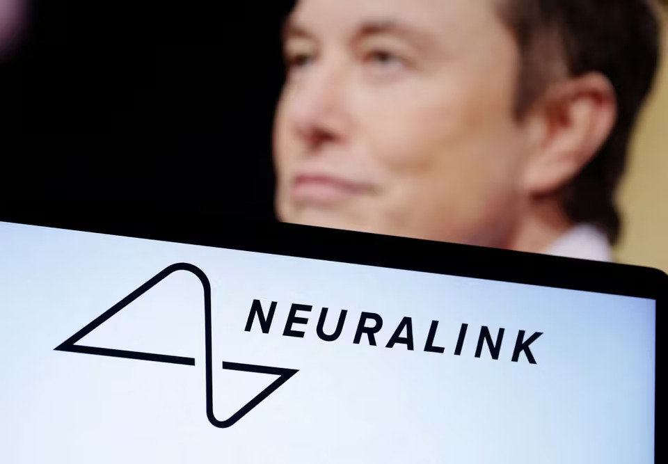 Neuralink logo and Elon Musk photo are seen in this illustration taken, December 19, 2022. REUTERS/Dado Ruvic/Illustration/File Photo Purchase Licensing Rights, opens new tab